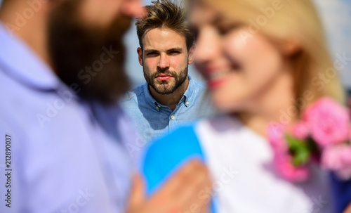 Couple romantic date lovers flirting. Lovers meeting outdoor flirt romance relations. Couple in love happy dating, jealous man watching woman prefers another macho instead him. Broken heart concept