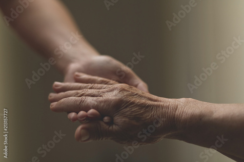 Nurse assistant helping grandmother