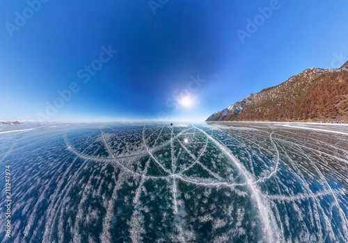 Patterns of cracks on a blue winter ice of Lake Baikal from Olkhon