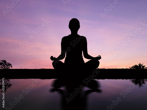 Silhouette woman meditate .