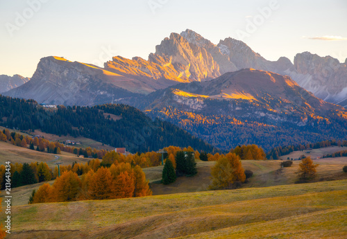 Amazing autumn scenery of Alpe di Siusi at sunrise, Dolomite Alps, Italy