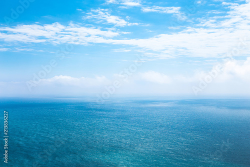 Beautiful seascape in the Atlantic ocean. Beautiful seascape with small waves on the water and amazing clouds in the sky
