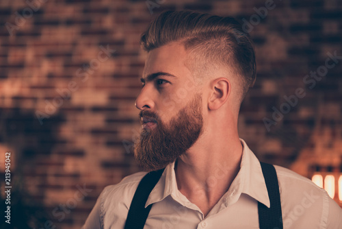 White shirt swag style mature vintage concept. Side half-faced profile view close up portrait of stunning virile masculine serious concentrated cool experienced expert hairdresser looking aside