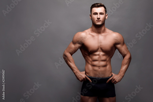 Athletic Man Fitness Model Torso showing big muscles.