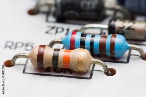 Resistor on circuit board close up. electronic hardware