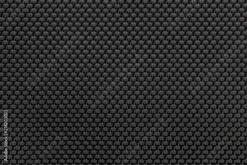 Black Nylon Fabric Texture Close-Up. Close-up of a black nylon fabric texture with a grid-like woven pattern, ideal for backgrounds, textiles, and material designs.