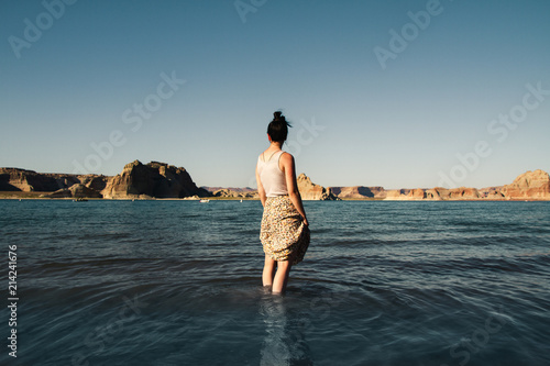 Girl wading in the water