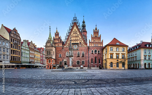 Gothic facade with astrinomical clock of old Town Hall in Wroclaw, Poland