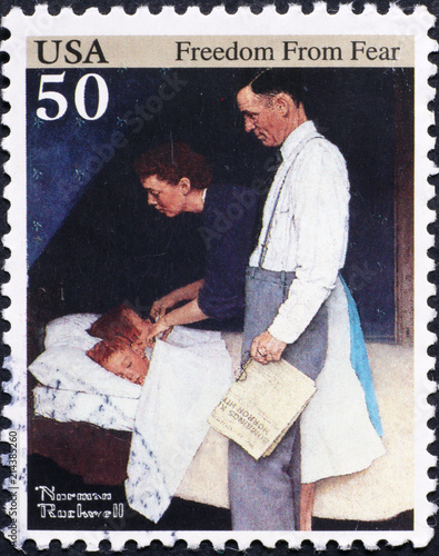 American family in painting by Norman Rockwell on stamp