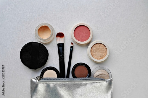 cosmetics and brushes on the white backgroung