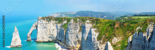 Picturesque panoramic landscape on the cliffs of Etretat. Natural amazing cliffs. Etretat, Normandy, France, La Manche or English Channel. Coast of the Pays de Caux area in sunny summer day