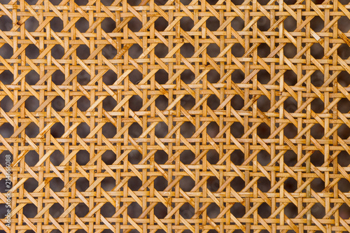 Close up of the pattern formed by open weave rattan cane