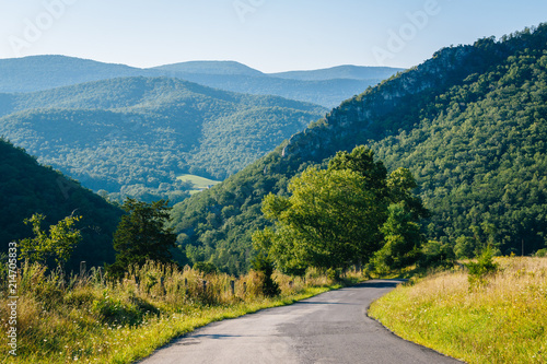 A road and view of mountains in the rural Potomac Highlands of West Virginia.