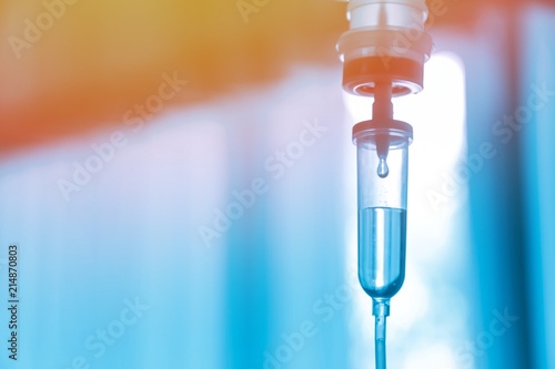 Set iv fluid intravenous drop saline drip hospital room,Medical Concept,treatment emergency and injection drug infusion care chemotherapy, concept.blue light background,selective focus 