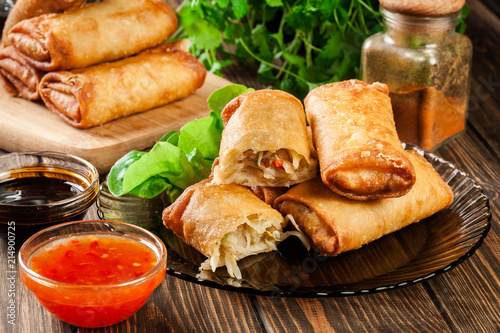 Spring rolls with chicken and vegetables served with sweet chili sauce or soy sauce