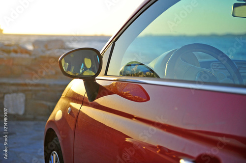 ew Fiat 500 parked by the sea