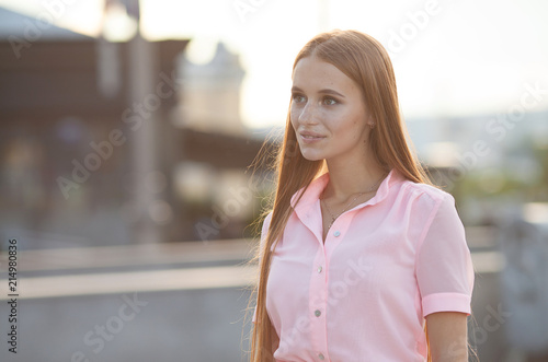 Portrait Of Young Smiling Beautiful Woman. Close-up portrait of a fresh and beautiful young fashion model posing outdoor. Summer outdoor portrait