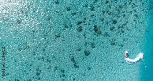 jet ski in a dream lagoon in French Polynesia, in an aerial view