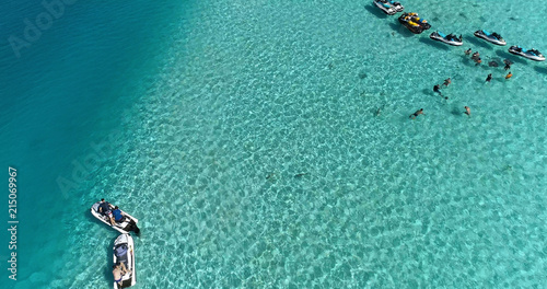 snorkeling in a dream lagoon in French Polynesia, in an aerial view