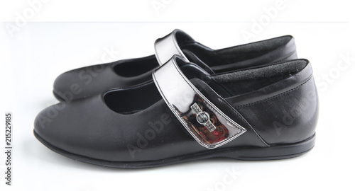 Black leather shoes isolated.