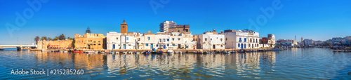 Waterfront panorama with picturesque houses and wall of kasbah at old port in Bizerte. Tunisia