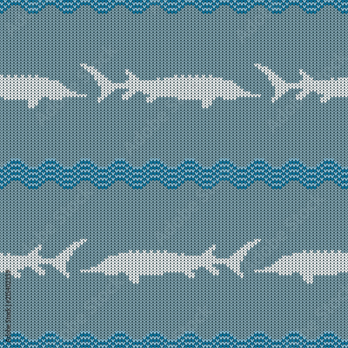 Knitted woolen seamless pattern with sturgeons in vintage blue tones