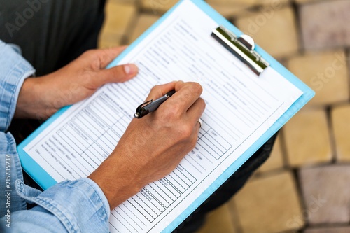 Closeup of a Person Filling a Track Record