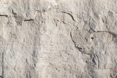 Background geology closeup limestone rock face showing weathered strata wallpaper