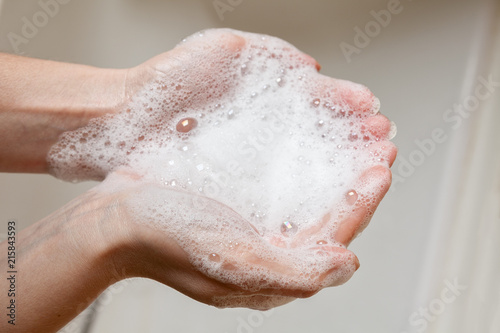 soap foam in female hands