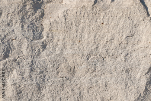 Background geology closeup limestone rock face showing weathered strata wallpaper