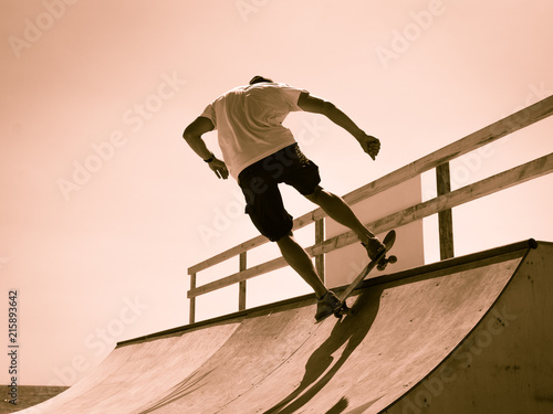 the guy skates on a ramp. tricks