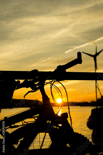 Bicycle and sunset by the sea