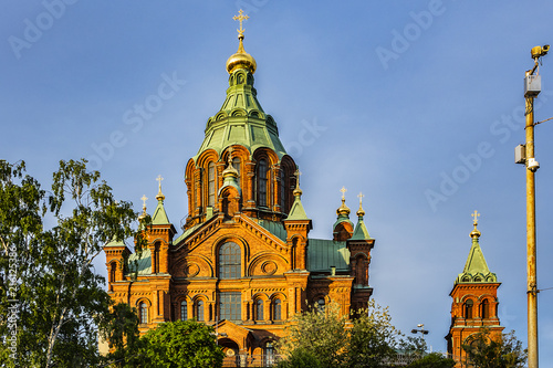 Uspenski cathedral (Uspenskin katedraali, 1862 - 1868), dedicated to Dormition of Theotokos (Virgin Mary). Sunset. Helsinki, Finland.