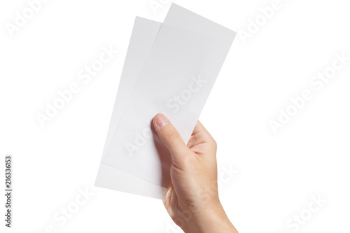 Male hand holding two blank sheets of paper (tickets, flyers, invitations, coupons, money, etc.), isolated on white background