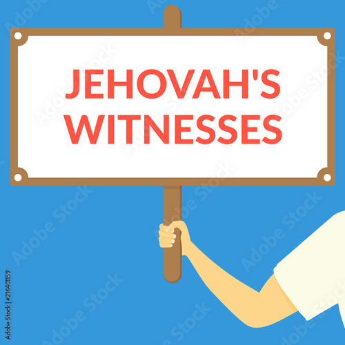 JEHOVAH'S WITNESSES. Hand holding wooden sign