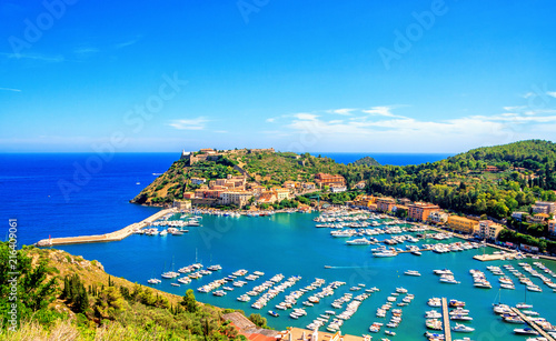 Panoramic aerial view of Porto Ercole town, Monte Argentario, Grosseto, Tuscany, Italy. Architecture and landmark of Porto Ercole and Italy. Tuscany is a region in central Italy