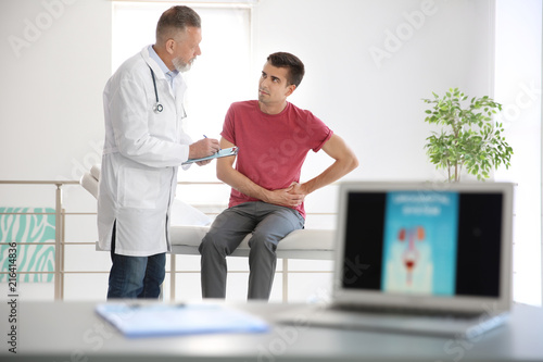 Man with health problem visiting urologist at hospital