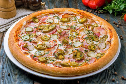 Spicy pizza with bacon and jalapeno