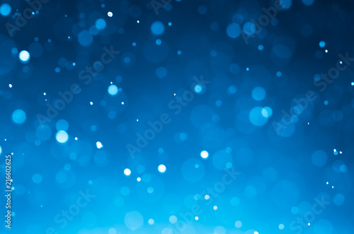 Dark blue abstract backgrounds with bokeh.