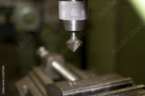 Industrial classic machine green workshop for metal craft work with exchangeable countersink drill bit