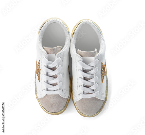 Pair of stylish new shoes on white background, top view