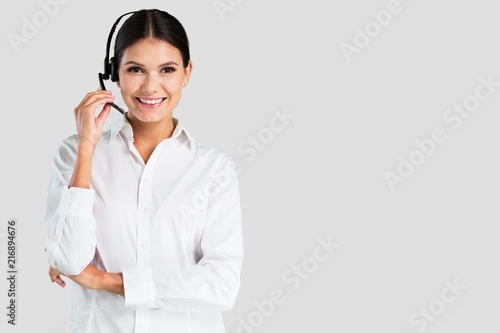 Young woman with headphones, call center