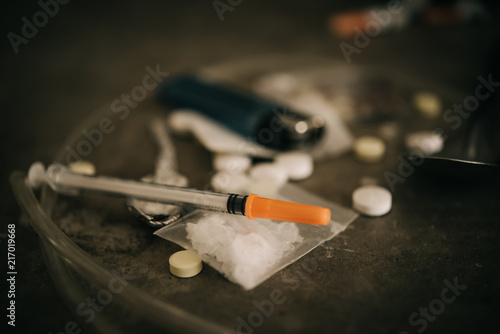 Asian men are drug addicts to inject heroin into their veins themselves.Flakka drug or zombie drug is dangerous life-threatening,Thailand no to drug concept,The bad guy drugs in the desolate