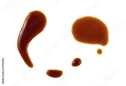 Puddle of soy sauce isolated on a white background