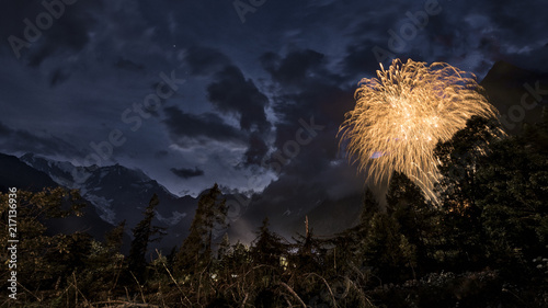 Fireworks in the woods and mountains night landscape