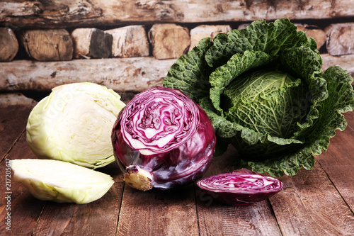 Three fresh organic cabbage heads. Antioxidant balanced diet eating with red cabbage, white cabbage and savoy