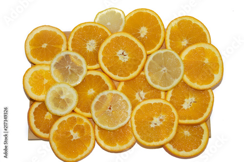 Sliced orange on a board isolated on white background.