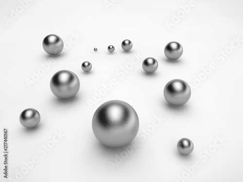 silver balls randomly scattered on the surface of a sphere of different sizes. The idea of disorder and chaos. Abstraction, picture isolated on white background. 3D redering.