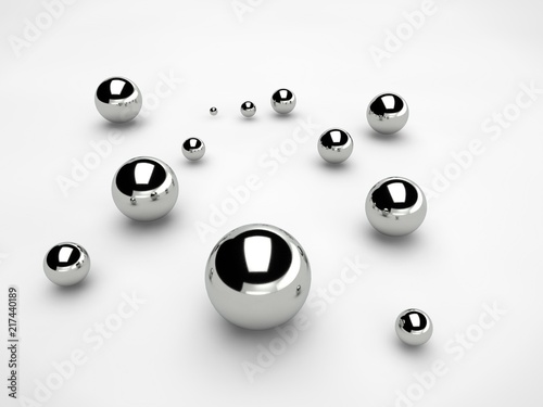 steel balls scattered over the surface of a sphere of different sizes. The idea of disorder and chaos. Abstraction, picture isolated on white background. 3D redering.