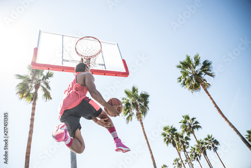 Baketball player making a dunk